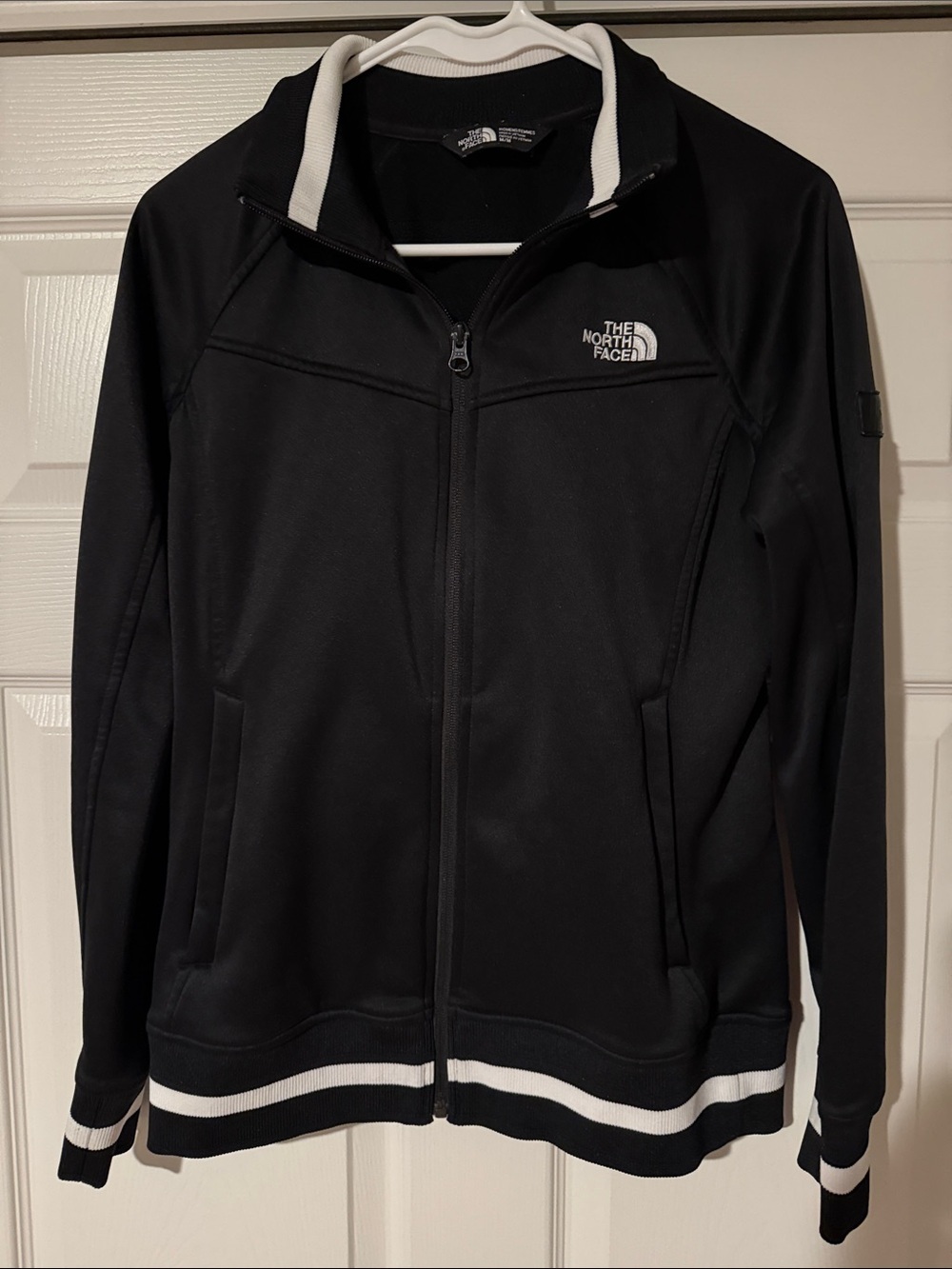 The North Face Black Jacket with White Trim
